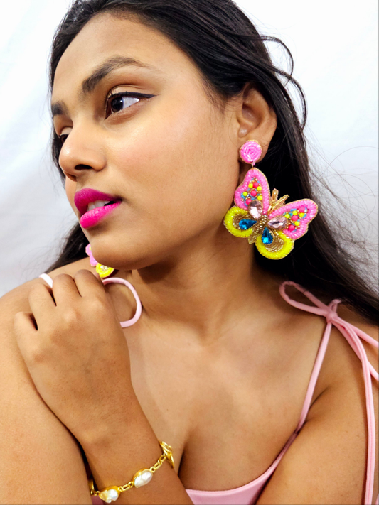 Pink butterfly earrings